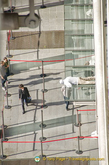 Looking down to ground level of the Centre Pompidou. Spot the artwork!
